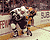 Stefan Ustorf checked by Ray Bourque